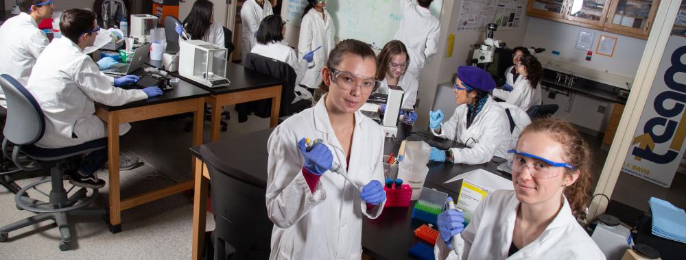 Students pose in the BioInnovation Lab