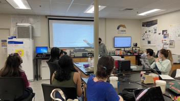 The algae to insulin student group reviews growth data from their algae.